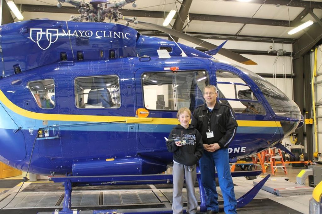 Logan Crawford met Mayo One pilot Joel Kozlowski at the helicopter’s hangar in Eau Claire.