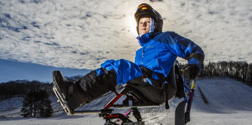 Spina bifida does not prevent Ty Wiberg from enjoying outdoor activities in winter, including monooskiing.