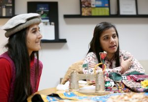 Pakistani exchange students Ana Khattak and Kiranti Jairamani talk about items from their country that help explain their culture.