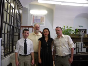 David Lewis with his two UW-EC students and Gul'nar Mel'nikova, director of the Butlerov Museum of the Kazan School of Chemistry). Left to right, Alex (Sasha) Davis, Lewis, Mel'nikova and Gene (Zhenya) Walsh. 